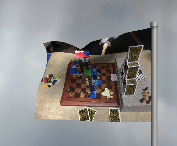 A picture of the Anarchy chess board (card pyramid, legos, Czech flag, etc), on the !wave flag pole.